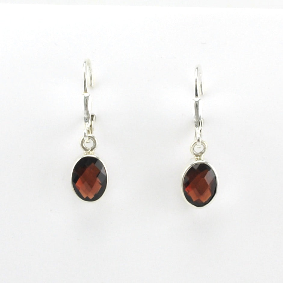 Alt View Sterling Silver Garnet 6x8mm Oval Dangle Earrings
