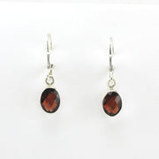 Alt View Sterling Silver Garnet 6x8mm Oval Dangle Earrings