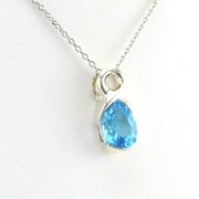Side View Sterling Silver Blue Topaz 7x9mm Tear Twist Necklace