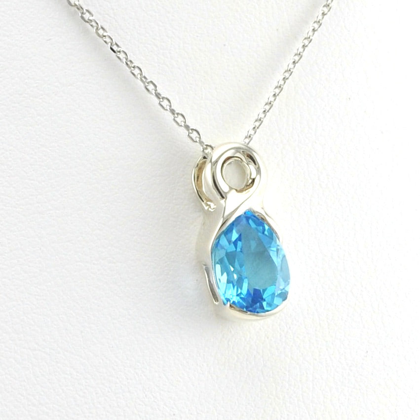 Side View Sterling Silver Blue Topaz 7x9mm Tear Twist Necklace