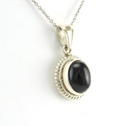 Side View Sterling Silver Black Star Diopside 10x12mm Oval Pendant