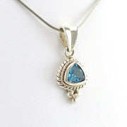 Side View Sterling Silver Blue Topaz 8mm Trillion Pendant