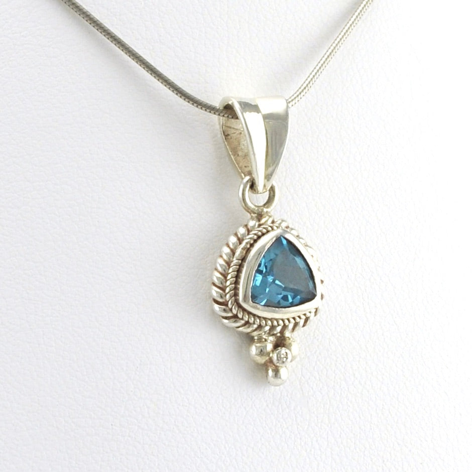 Side View Sterling Silver Blue Topaz 8mm Trillion Pendant