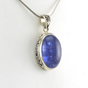 Side View Sterling Silver Tanzanite 12x22mm Cabochon Oval Bali Pendant