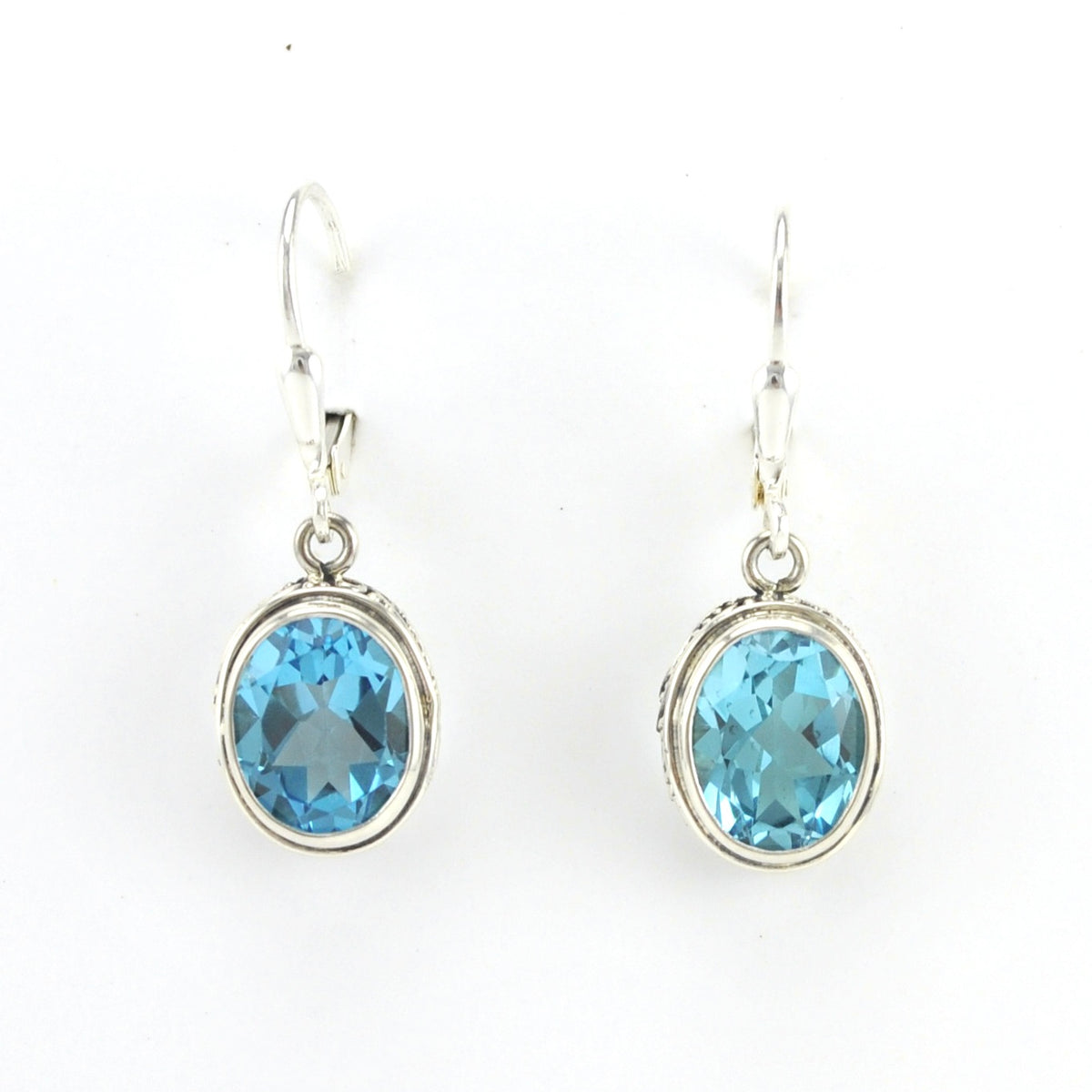 Alt View Sterling Silver Blue Topaz 8x10mm Oval Bali Dangle Earrings