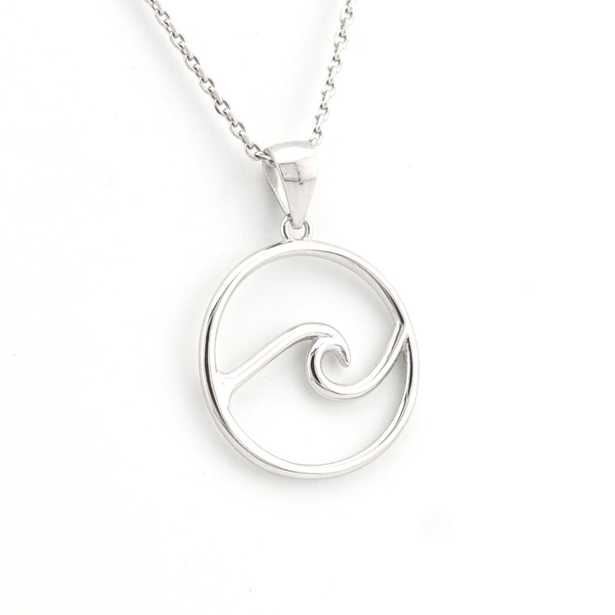 Silver wave pendant necklace on a white background
