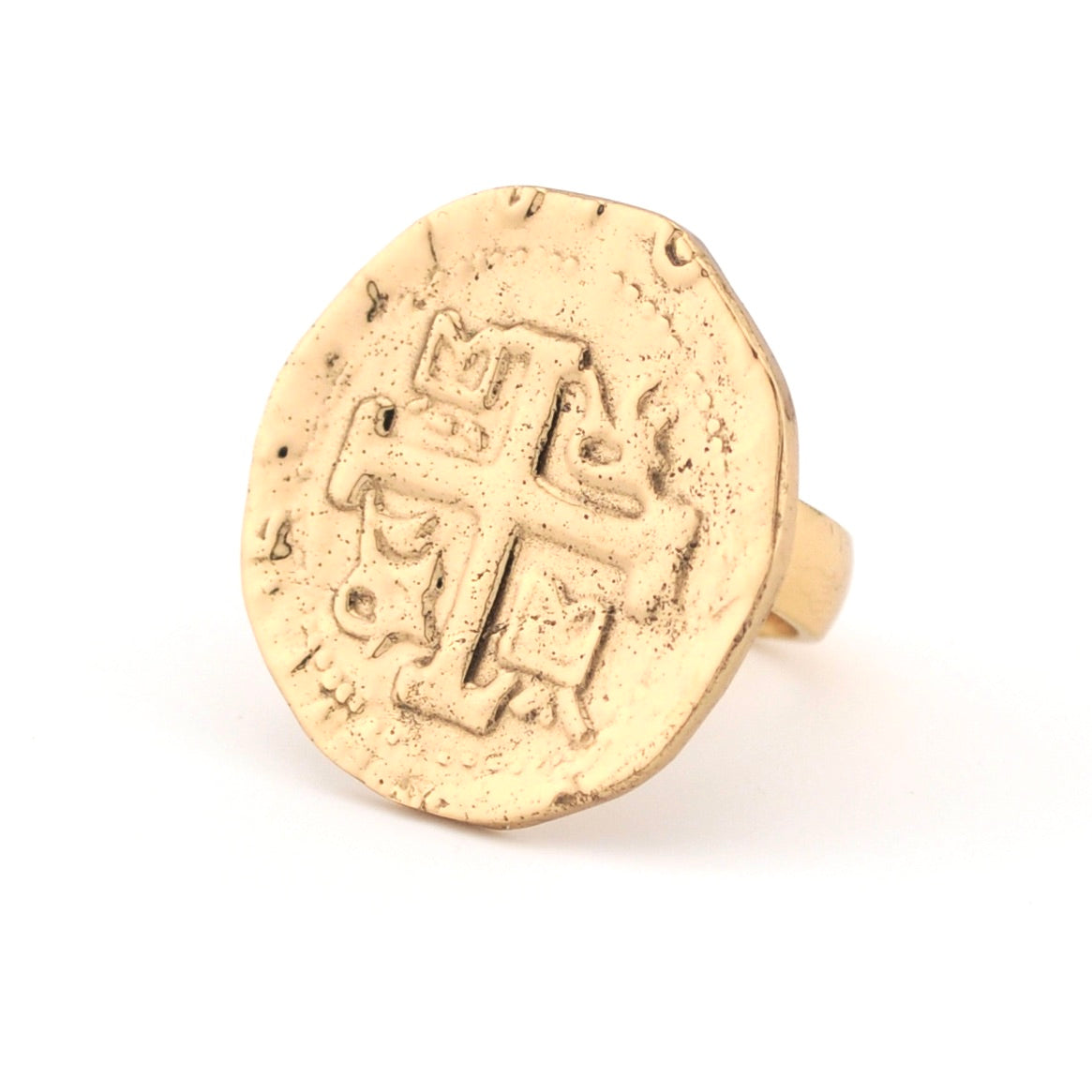 Gold ring with a detailed design on a white background