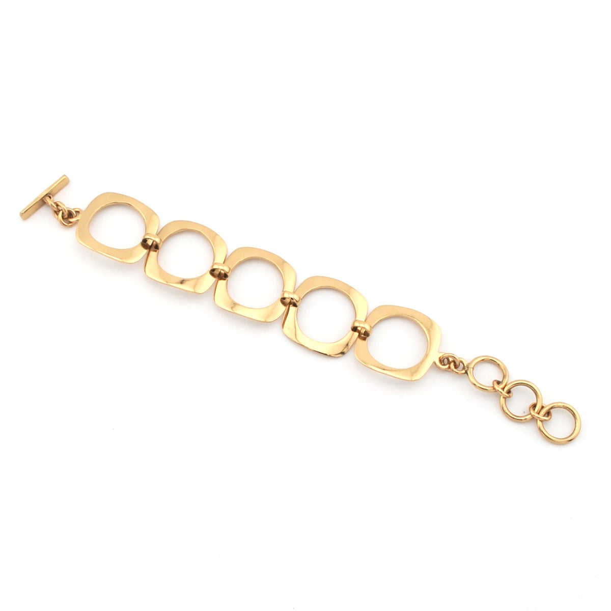 Gold bracelet with interlocking circular links on a white background