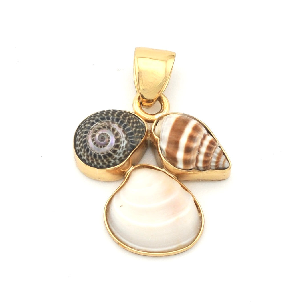 Gold pendant with shell and stone designs on a white background