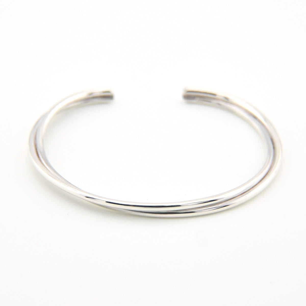 Silver bangle on a white background
