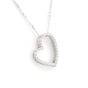 A silver heart-shaped pendant necklace adorned with small clear stones, suspended from a delicate silver chain against a plain white background.