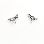 A pair of silver dragonfly stud earrings on a plain white background.