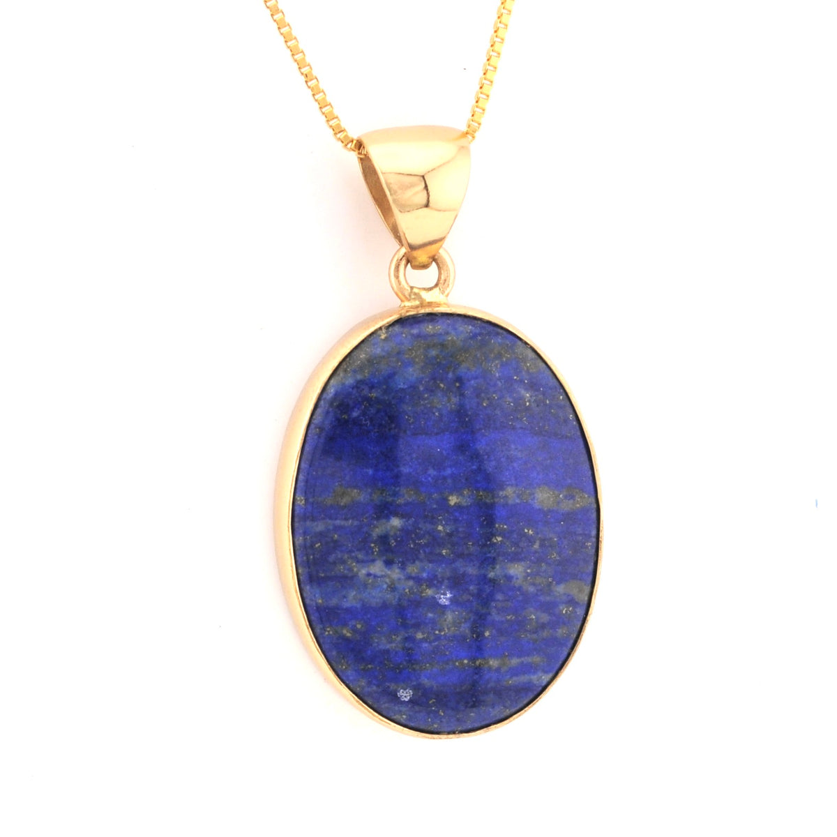 Gold pendant with a blue stone on a white background