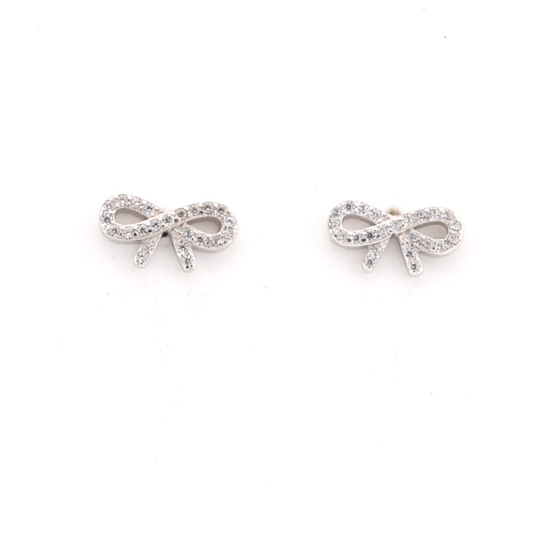 Silver bow-shaped earrings on a white background
