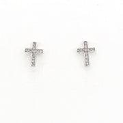 Pair of cross-shaped earrings on a white background