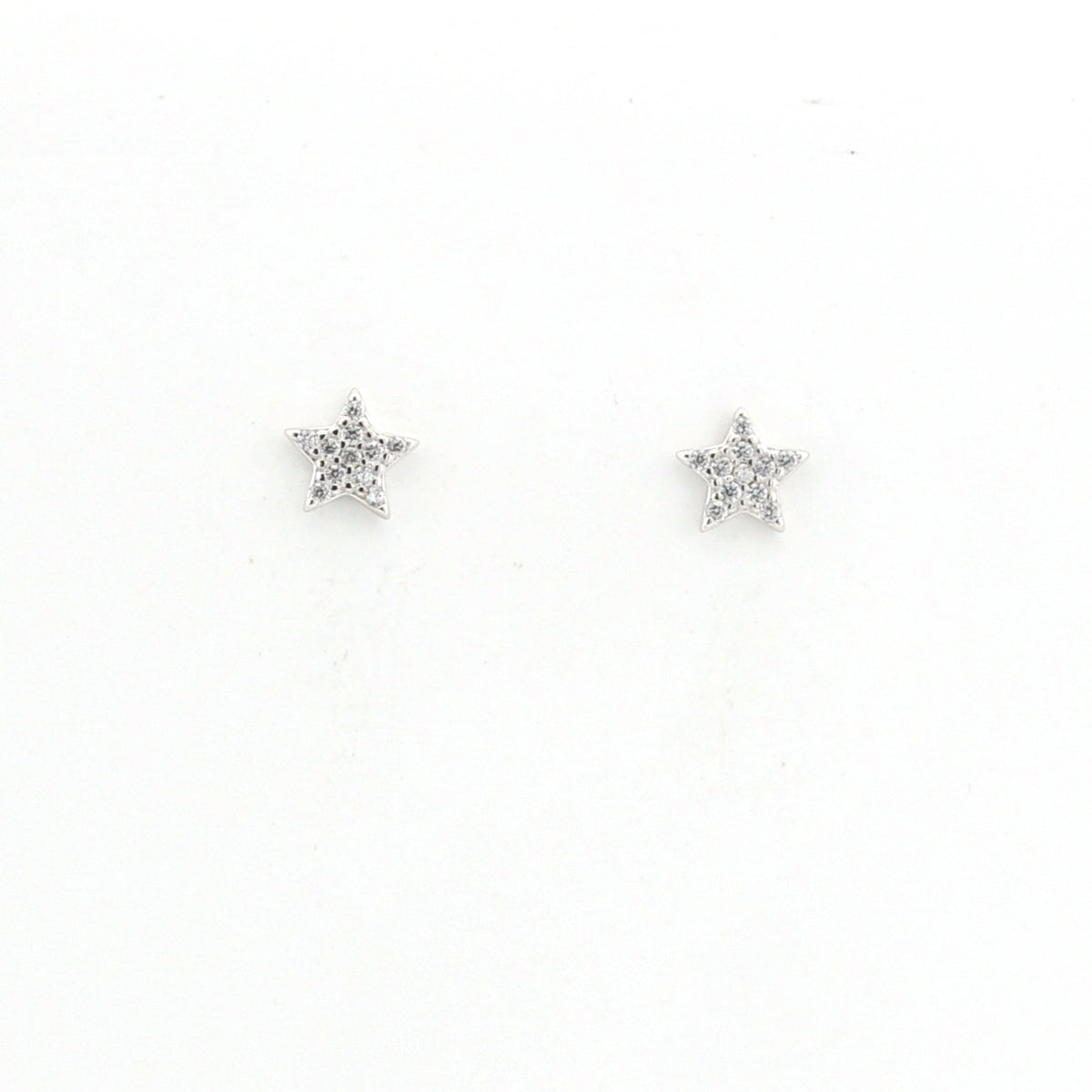 Star-shaped earrings with clear stones on a white background