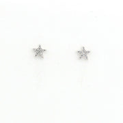 Star-shaped earrings with clear stones on a white background