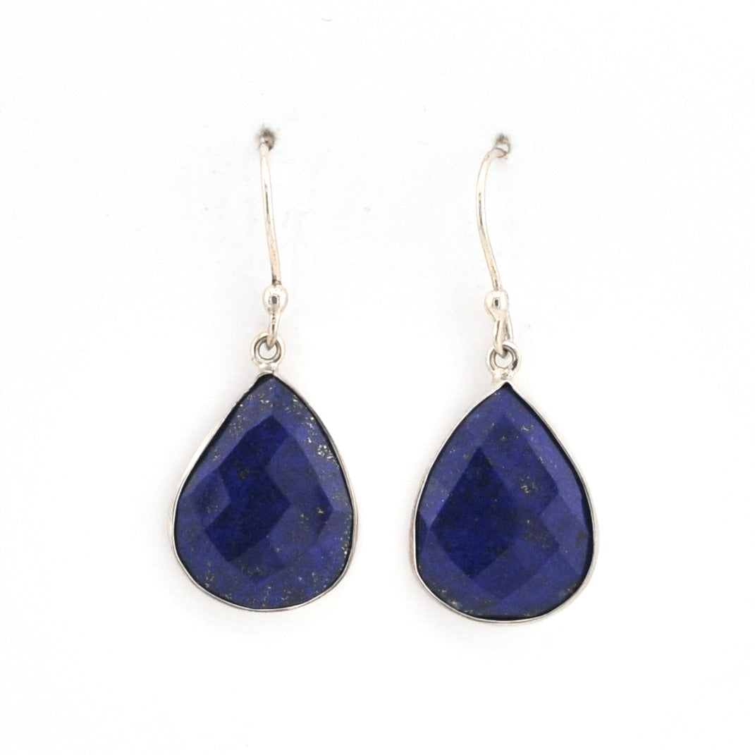 Pair of blue teardrop earrings on a white background