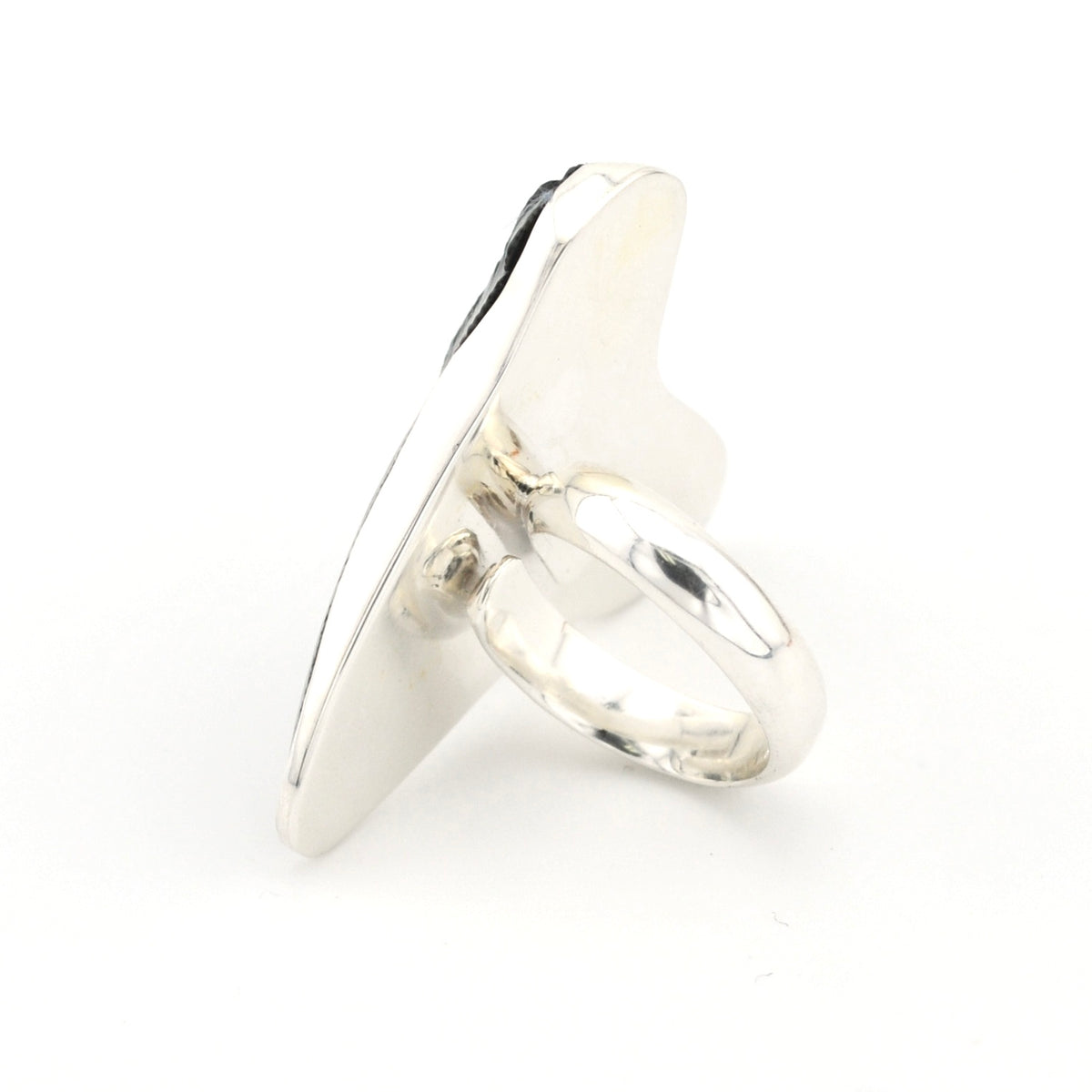 Silver ring on a white background