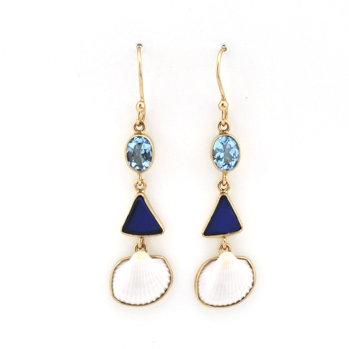 Pair of earrings with blue gemstones and gold accents on a white background