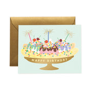 Birthday card with a cake illustration and 'Happy Birthday' text, featuring a brown envelope.