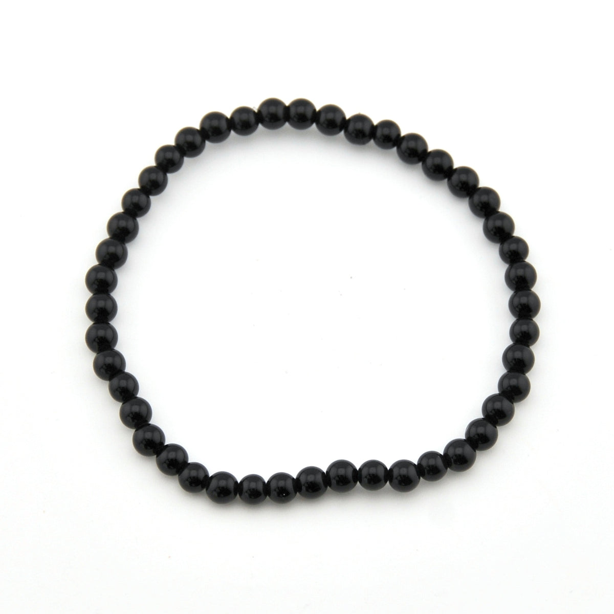 Black beaded bracelet on a white background