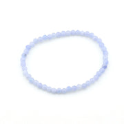 Light blue beaded bracelet on a white background