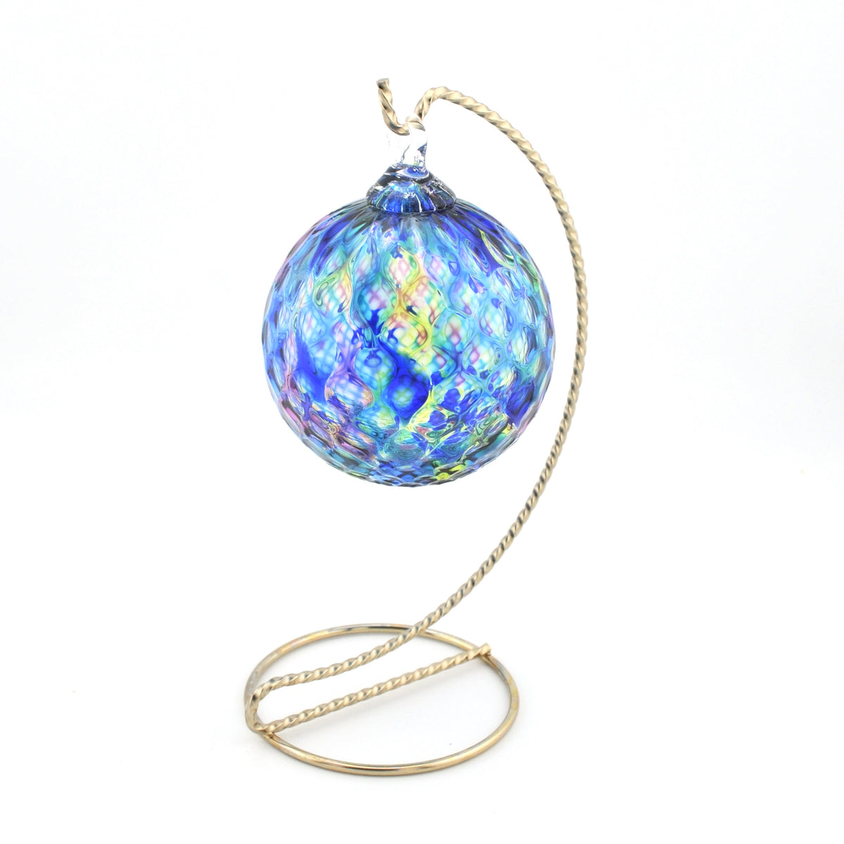 Decorative glass ball with a gold stand on a white background