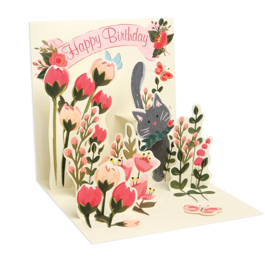 Pop-up birthday card with flowers and a cat illustration