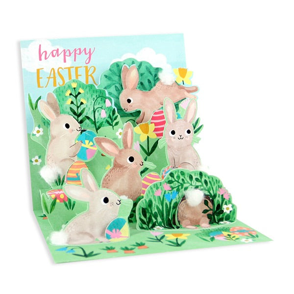 Easter card with bunnies and flowers on a white background