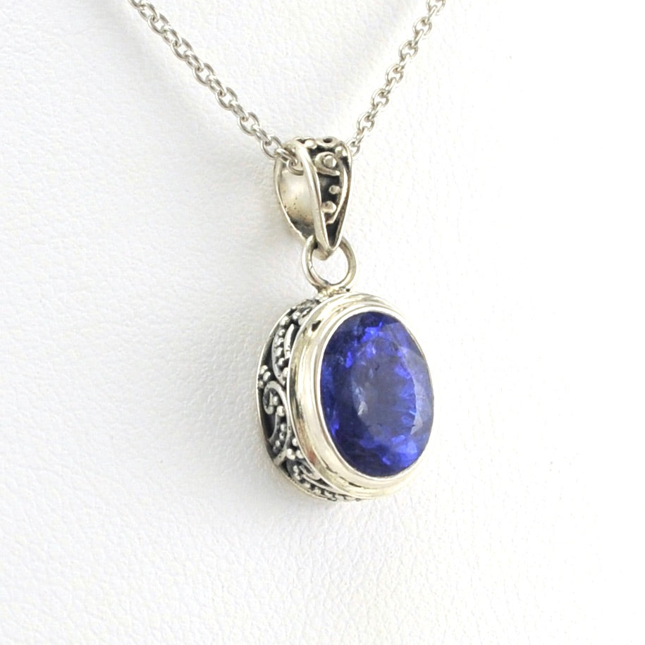 Side View Sterling Silver Tanzanite 7x9mm Oval Bali Necklace
