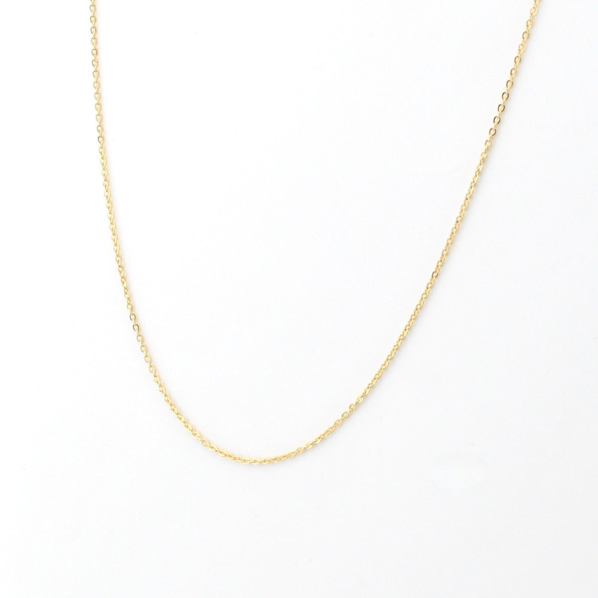 Gold chain on white background