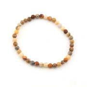 Multicolored beaded bracelet on a white background