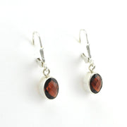 Side View Sterling Silver Garnet 6x8mm Oval Dangle Earrings