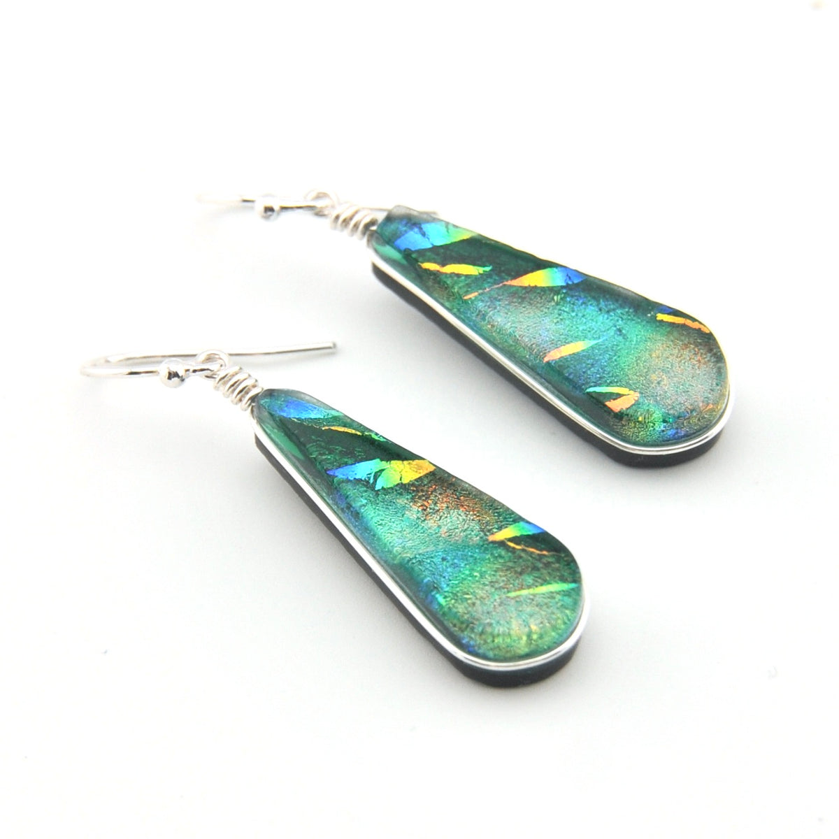 Colorful drop earrings on a white background