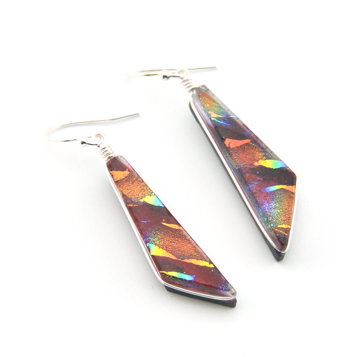 Colorful geometric earrings on a white background