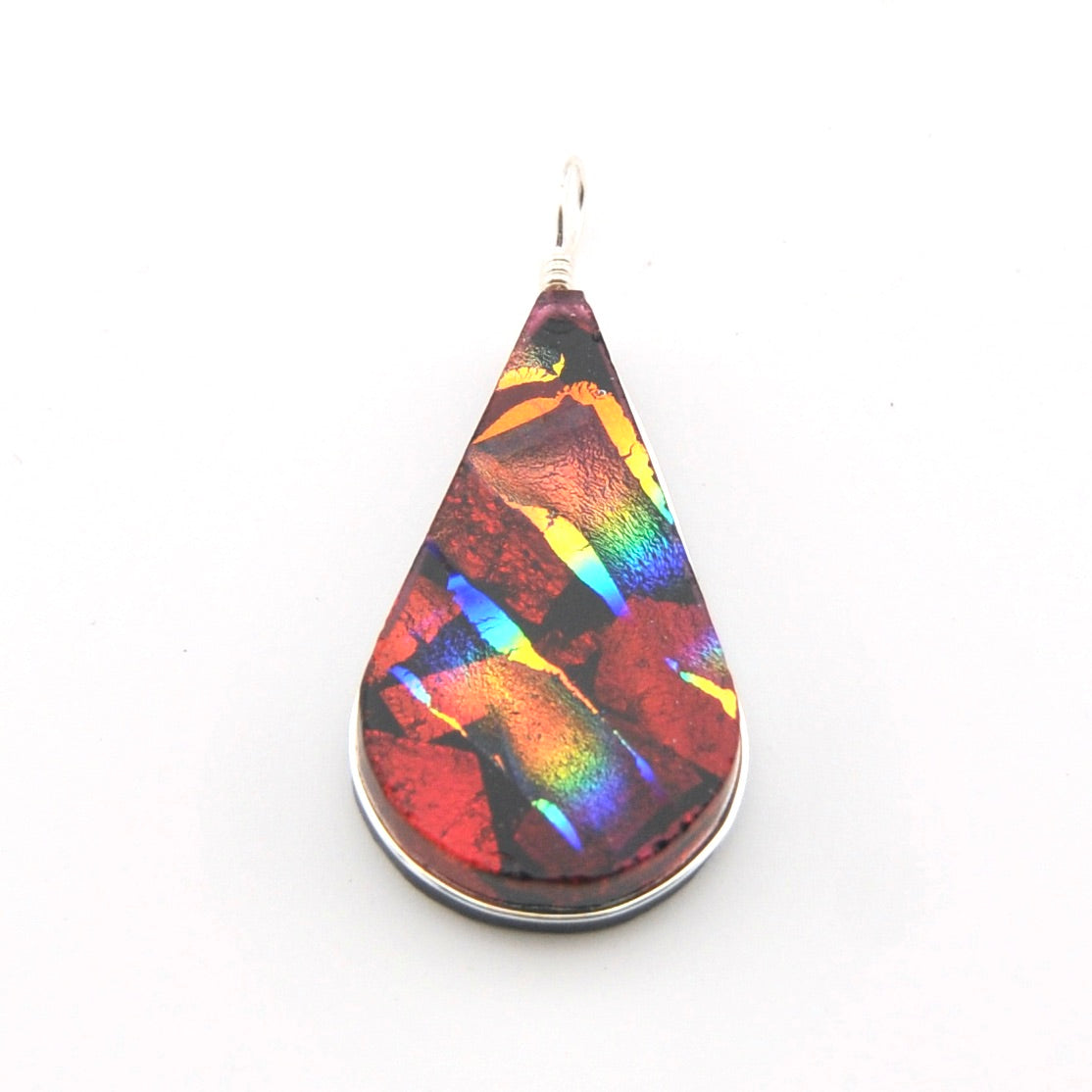 Teardrop-shaped pendant with multicolored iridescent pattern on a white background