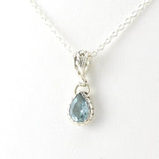 Side View Sterling Silver Blue Topaz Tear Necklace