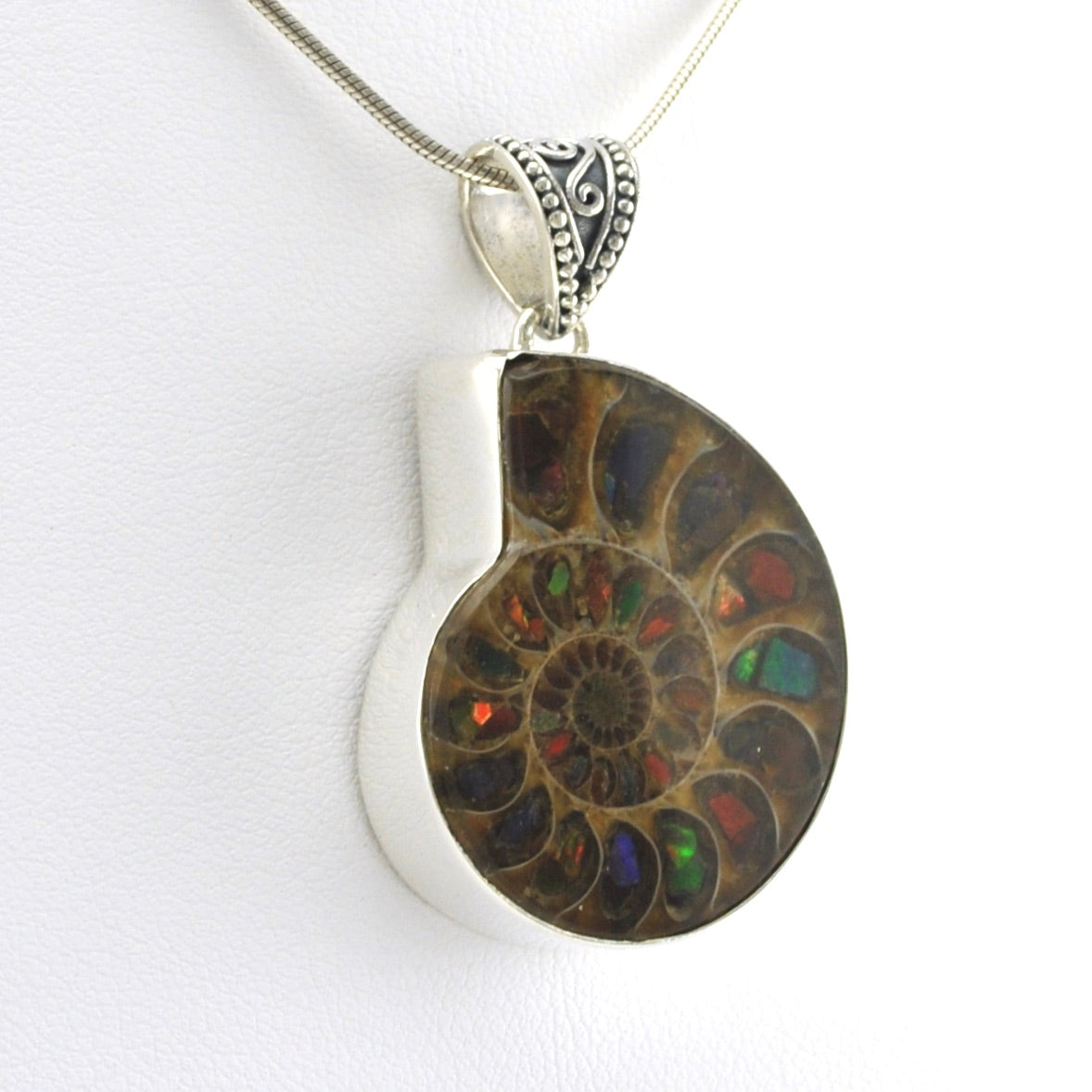 Side View Silver Ammonite with Inlaid Ammolite Pendant