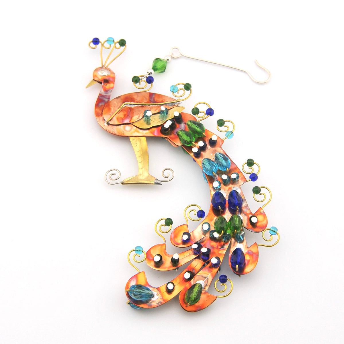 Decorative peacock ornament with colorful beads on a white background