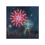 Fireworks over a cityscape with buildings against a dark blue sky.