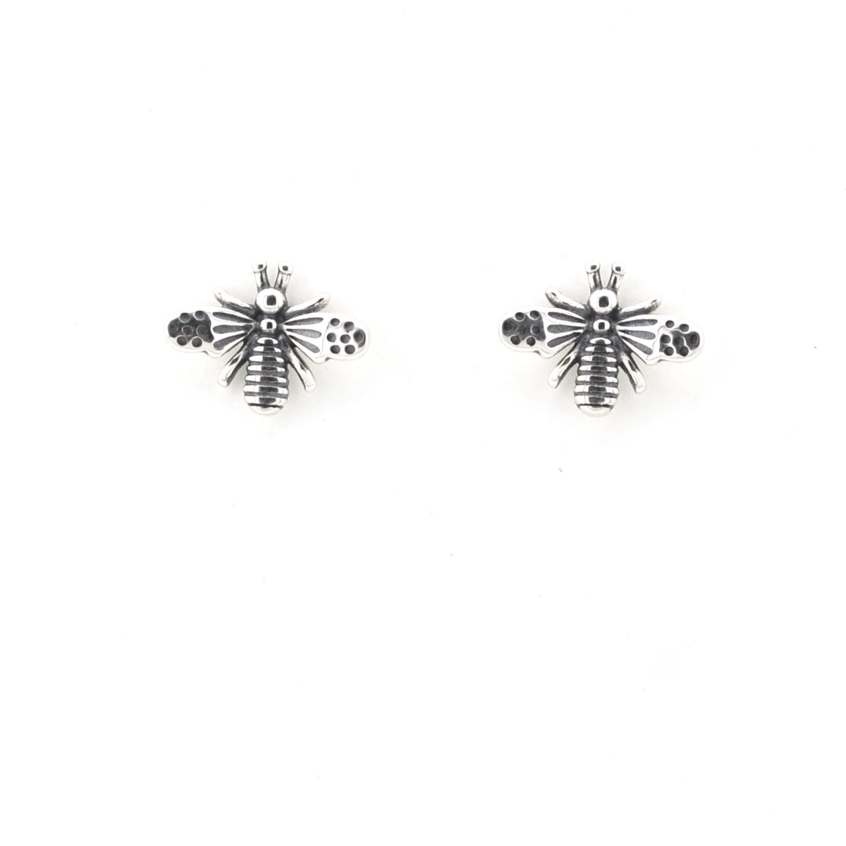 A pair of silver-toned insect stud earrings, shaped like small bees or bumblebees with textured wings and small black enamel details, shown on a plain white background.