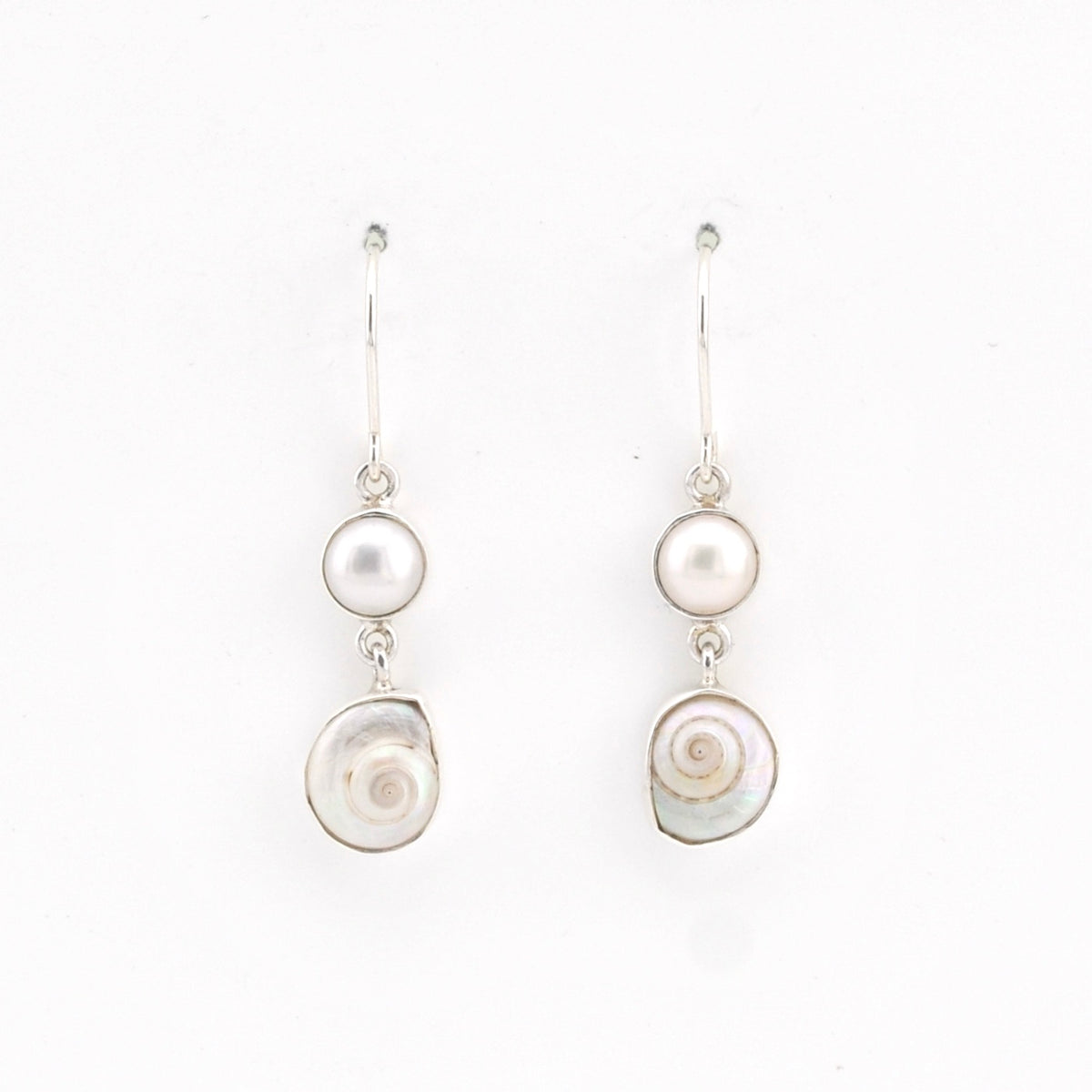 Pair of pearl earrings on a white background