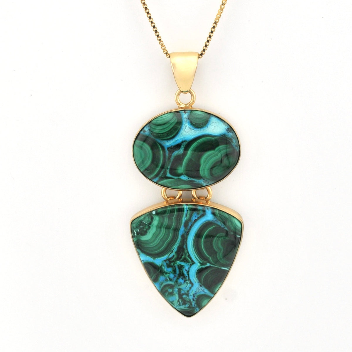 Necklace with green marbled pendant on a white background