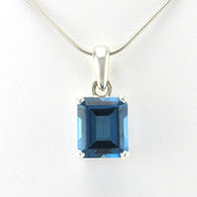 Front View Silver Blue Topaz 10x12mm Rectangle Prong Set Pendant