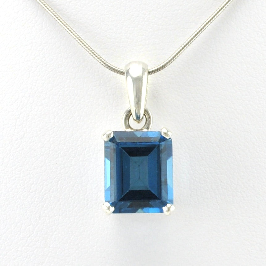 Front View Silver Blue Topaz 10x12mm Rectangle Prong Set Pendant
