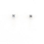 Pair of diamond stud earrings on a white background