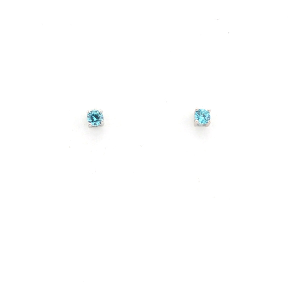 Pair of blue gemstone stud earrings on a white background