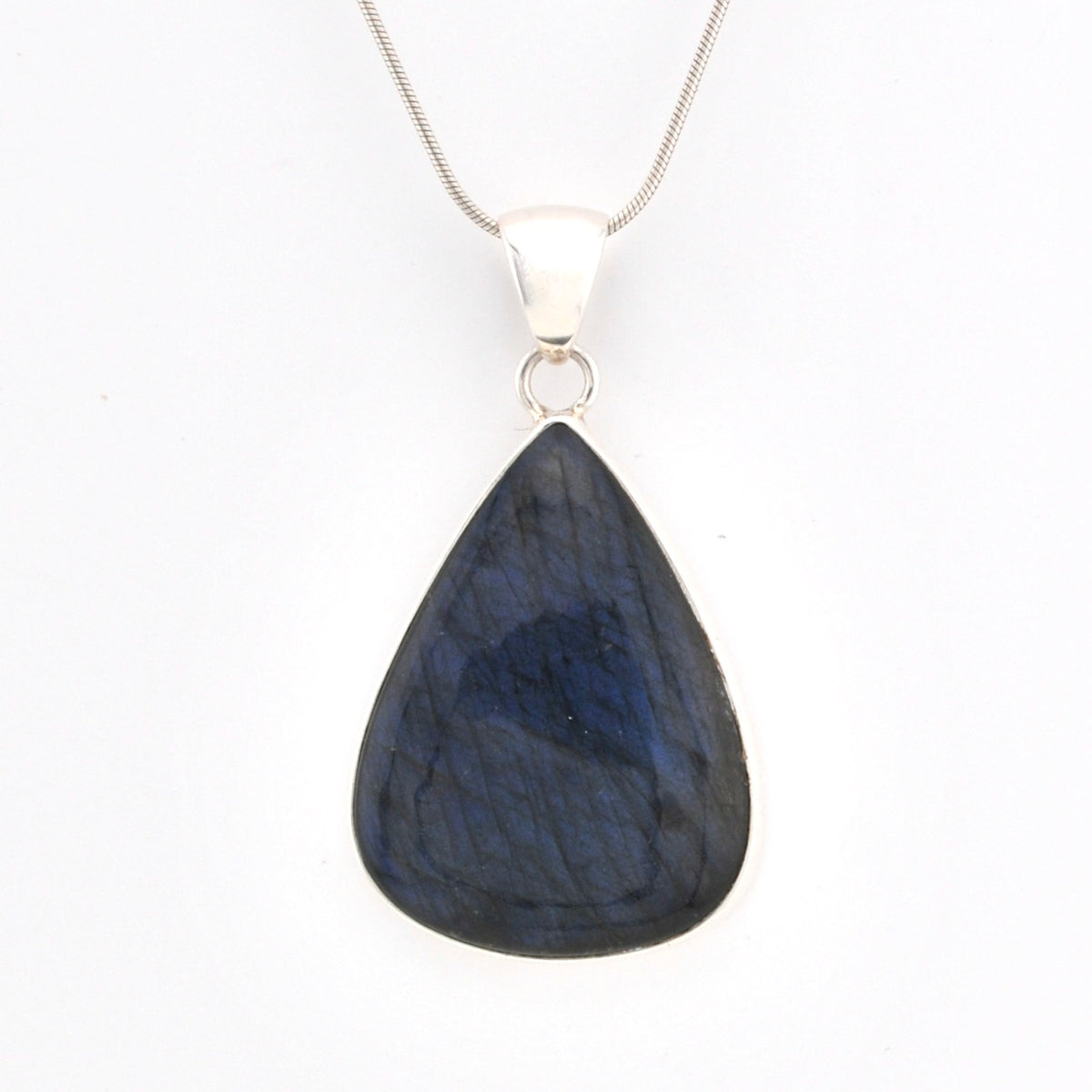 Teardrop-shaped blue pendant on a white background