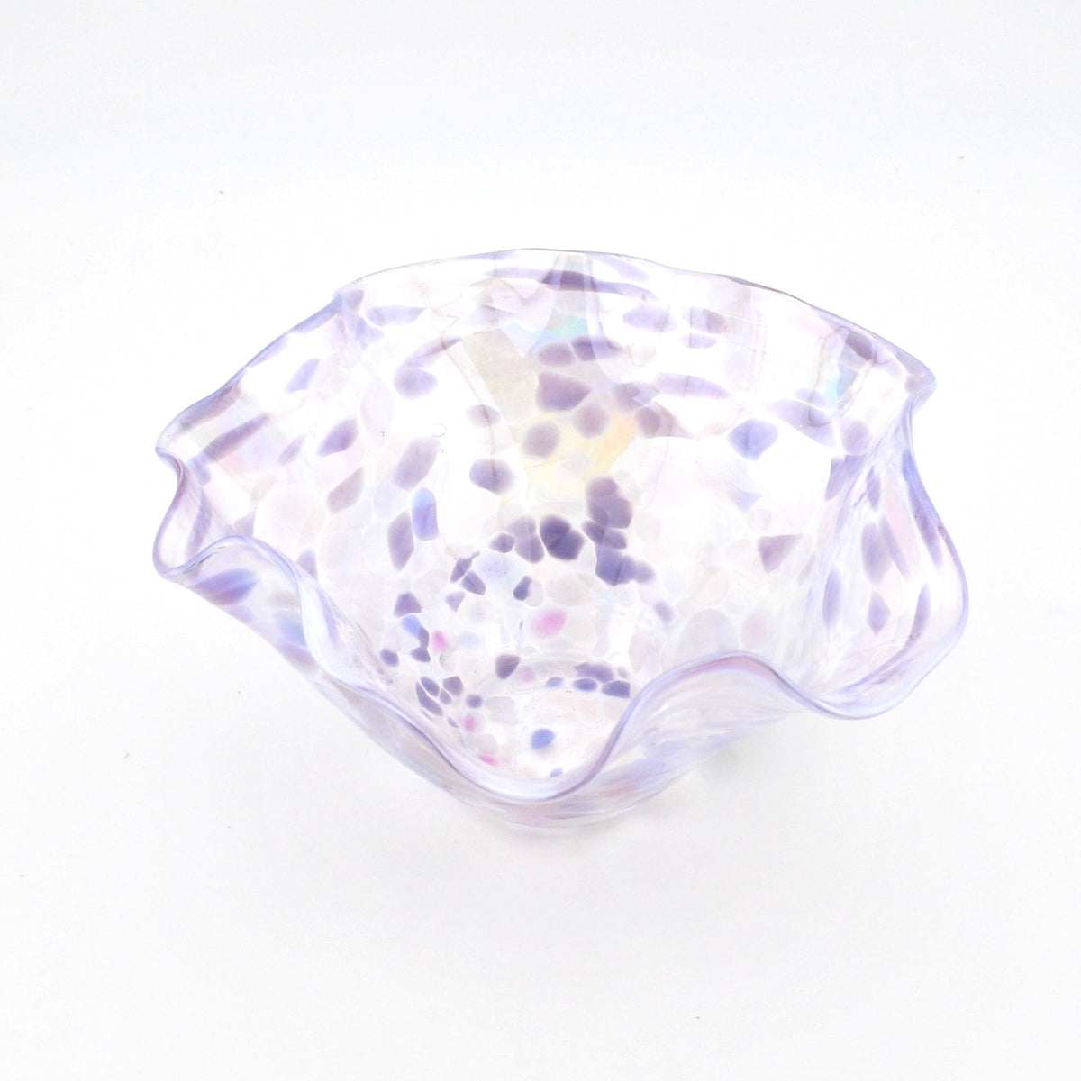 Clear glass bowl with purple speckles on a white background